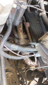 Passenger side. Rusty headers. These have been in the car since 2008 so they were possibly due to be recoated.